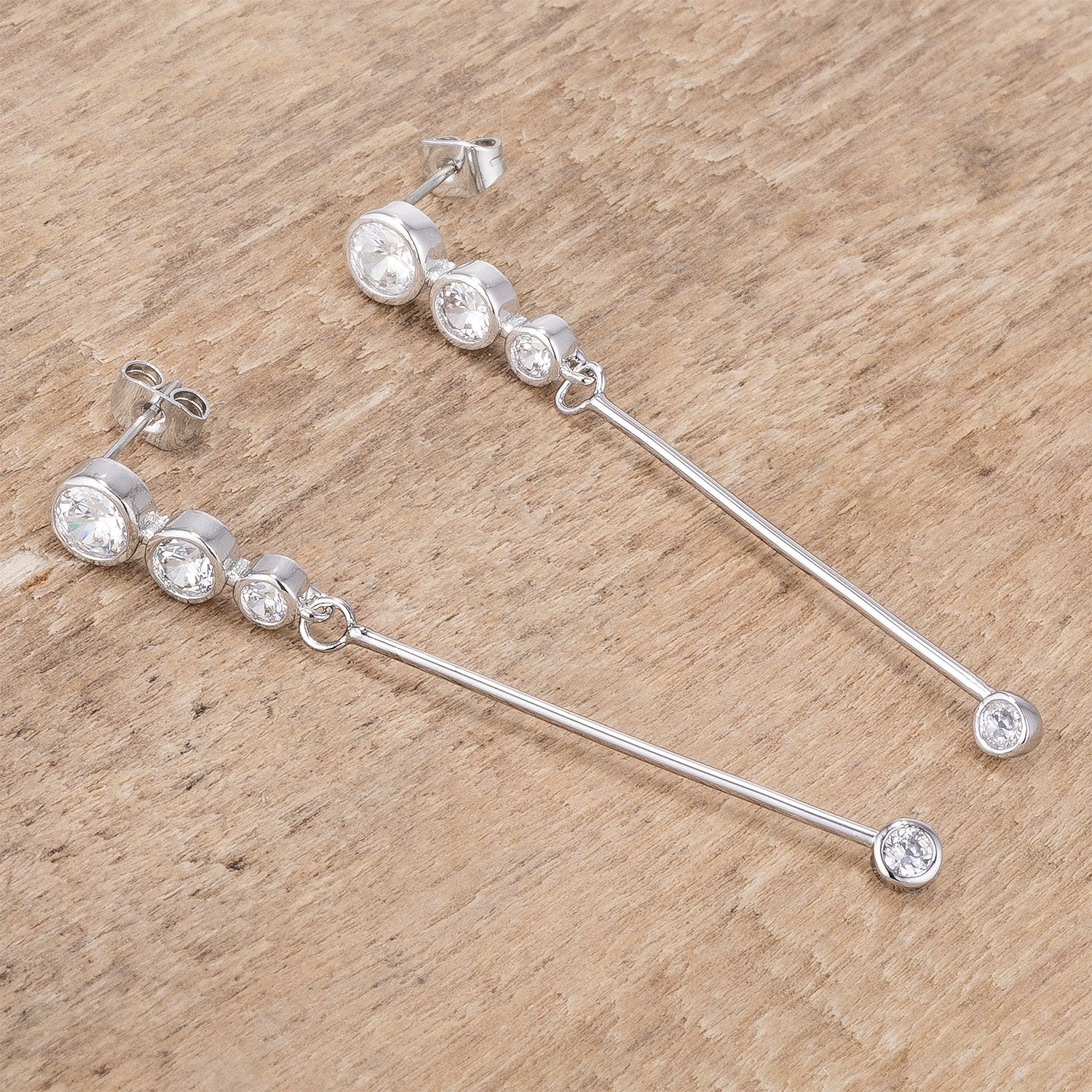 Graduated Rhodium Plated Drop Cubic Zirconia Earrings.