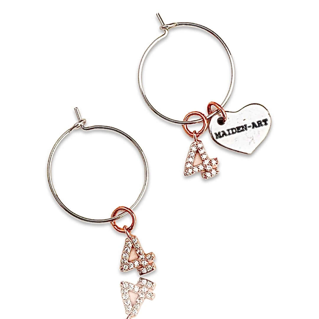 Number hoop earrings in silver, rose gold and rhinestones.